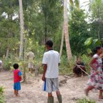 Bersihkan TPU, Sertu Saroji Himbau Warga Tetap Stay Home