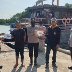 Tekan Penyebaran Covid-19, Polsek Kawasan Pelabuhan Sri Bintan Pura Tanjungpinang Terus Galakkan Pembagian Masker dan Beri Imbauan