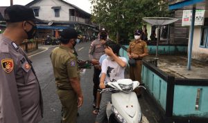 Polsek Serasan Bersama satgas Covid Kecamatan Laksanakan Pengetatan PPKM MIKRO