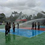 Naik Pangkat, 26 Personil Polres Natuna di Siram Water Canon