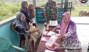 Babinsa Sertu Budi Dampingi Nakes Dalam Kegiatan Posyandu Bagi Anak