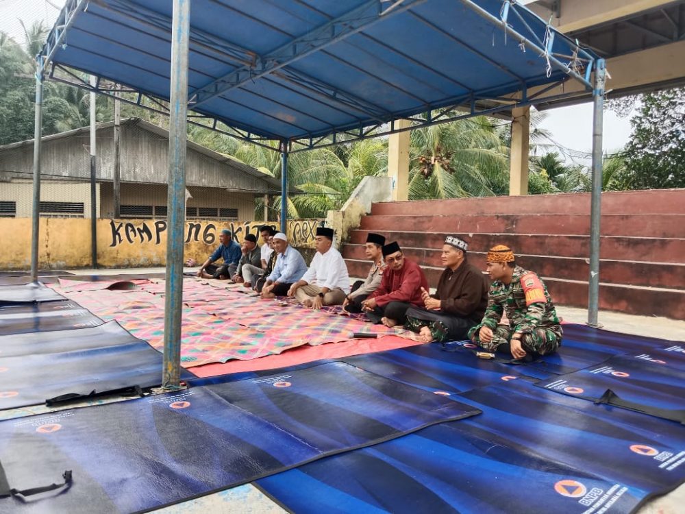 Babinsa Serda Mawardi Hadiri Undangan Yasinan dan Do’a Tolak Bala Pasca Longsor Serasan