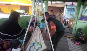 Babinsa Koramil 03/Sedanau Dampingi Kegiatan Posyandu Desa Selaut