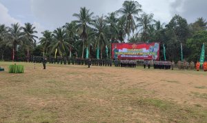 Diguyur Hujan, Bupati Natuna Pimpinan Upacara Pembukaan TMMD Ke-118 Desa Selemam
