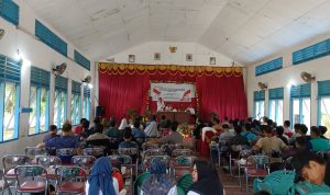 Wakili Danramil, Babinsa Serma Indra Susilo Hadiri Penyerahan Sertifikat Tanah Program PTSL Oleh Bupati