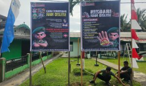 Koramil 06/Serasan Pasang Spanduk “Stop” Judi Online Bagi Anggota dan Masyarakat